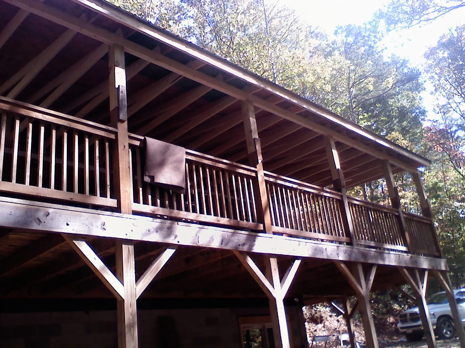 Timber framing under a new elevated porch and deck — Roof Leak Repair in Gallatin Gateway by Roofing Brothers